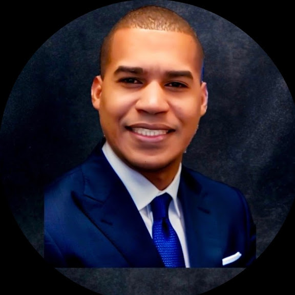 about pedro in suit with blue tie